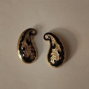 Black and gold tone clip earrings with rhinestones